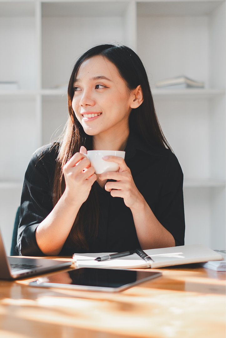 asian-freelance-woman-smile-typing-keyboard-working-laptop-wooden-table-home-entrepreneur-woman-working-her-business-cafe-business-work-anywhere-concept 1